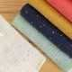 Tissu double gaze de coton pois doré - menthe claire x 10cm