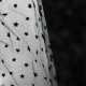 Tulle souple floqué étoile noir sur noir au mètre